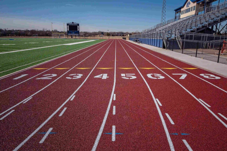 Installed sports track showcasing the final product of a project completed by T3 Global Projects.